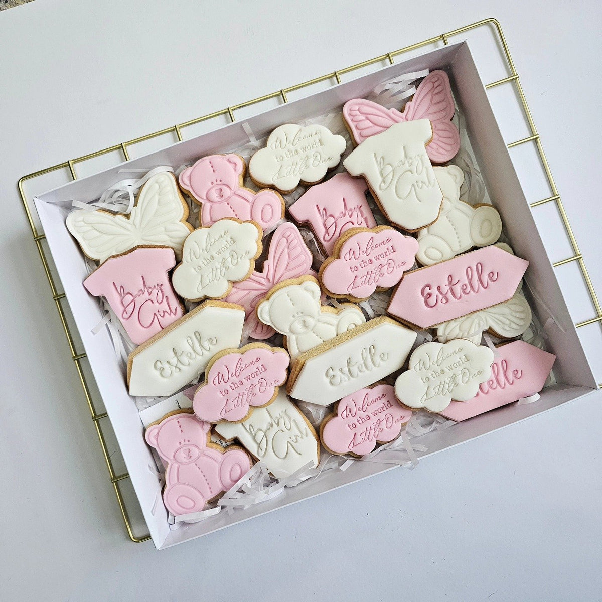 Pink welcome to the world biscuits