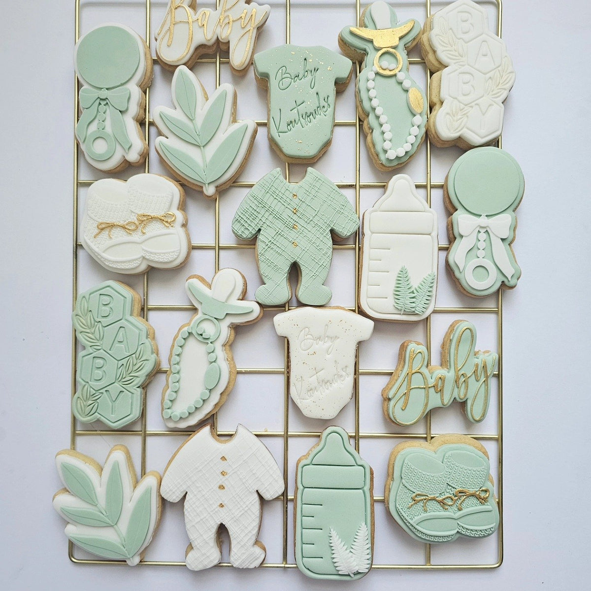 Sage, white and gold baby shower biscuits