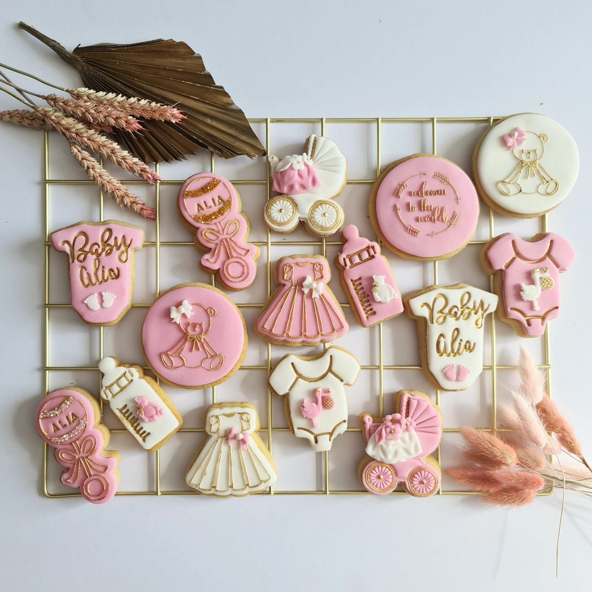 White, pink and gold new baby biscuits