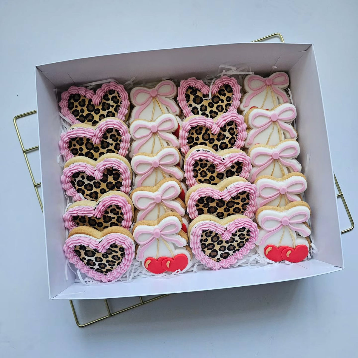 Leopard print and cherry biscuits