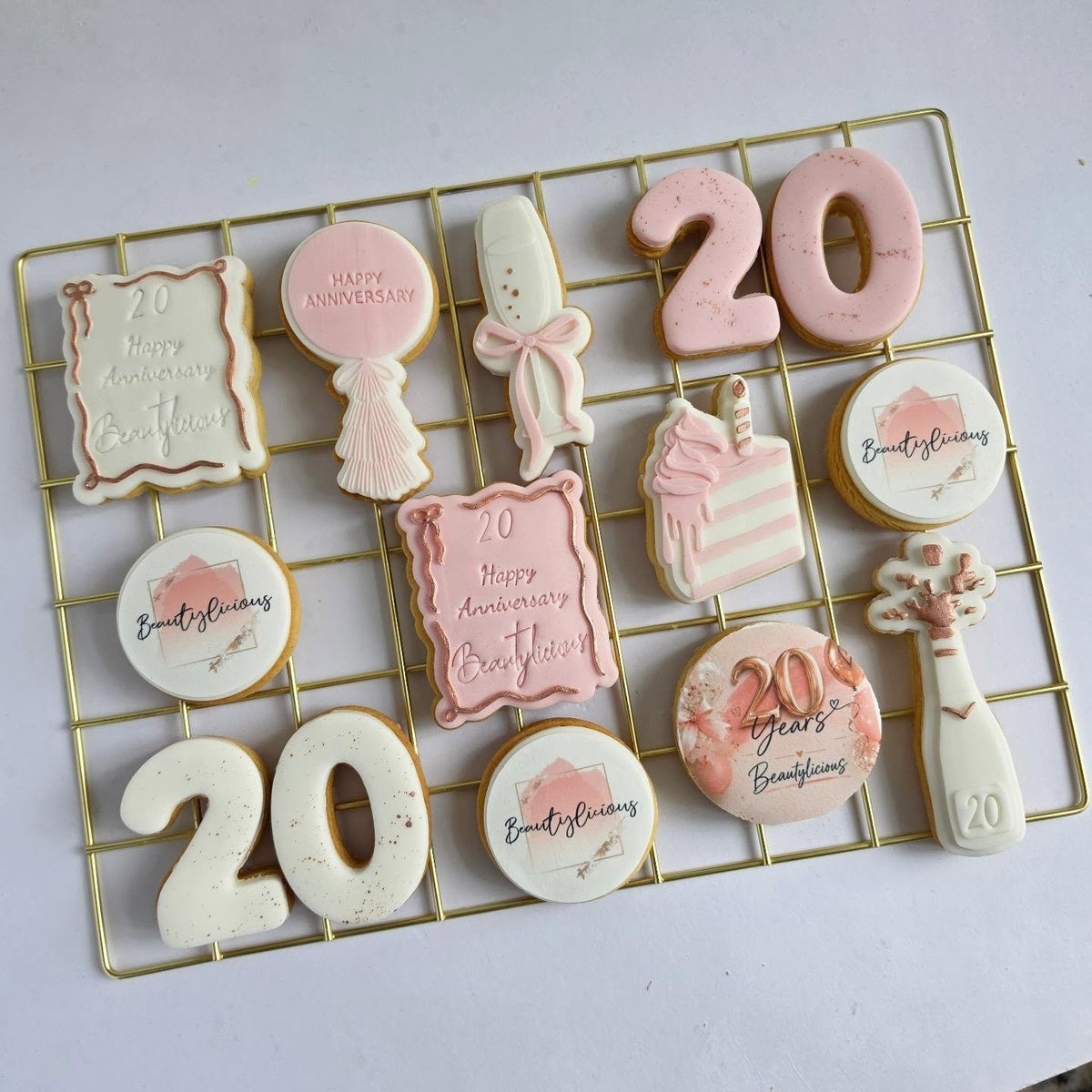 Pink anniversary biscuits with bows