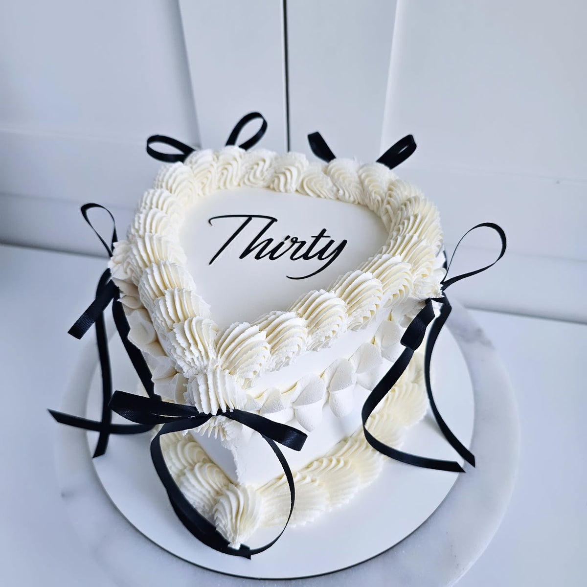 Black and white 30th heart cake