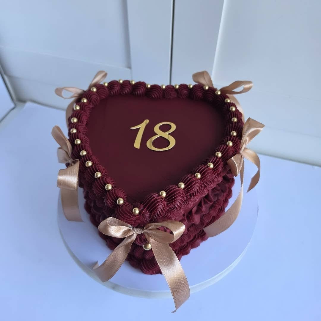 Burgundy and gold heart cake