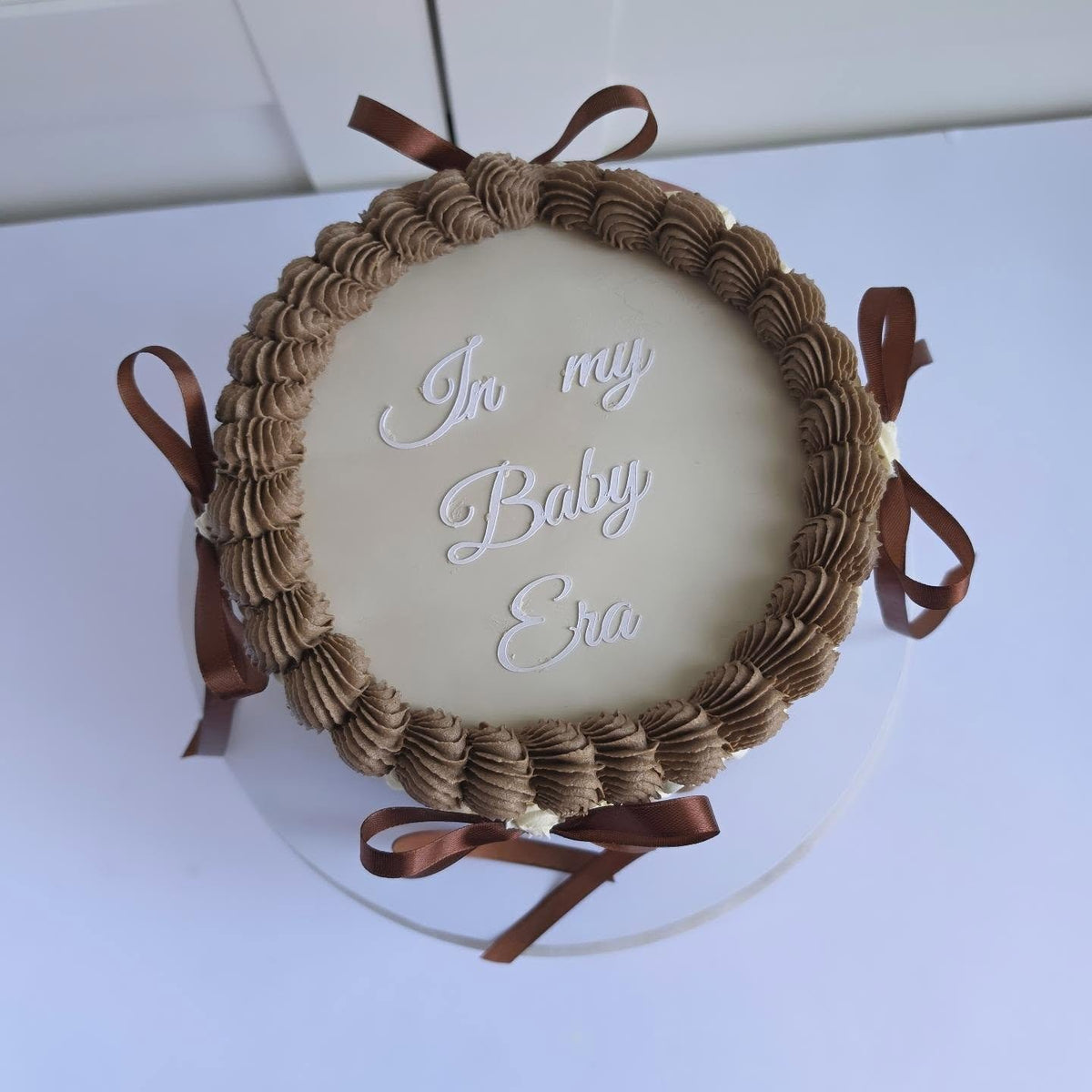 Chocolate brown baby shower cake