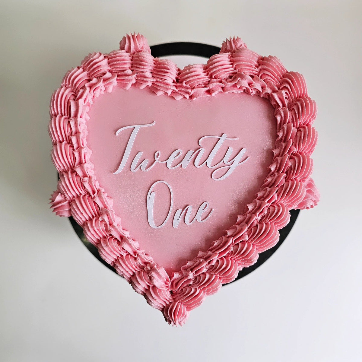 Pink vintage heart cake with ruffles