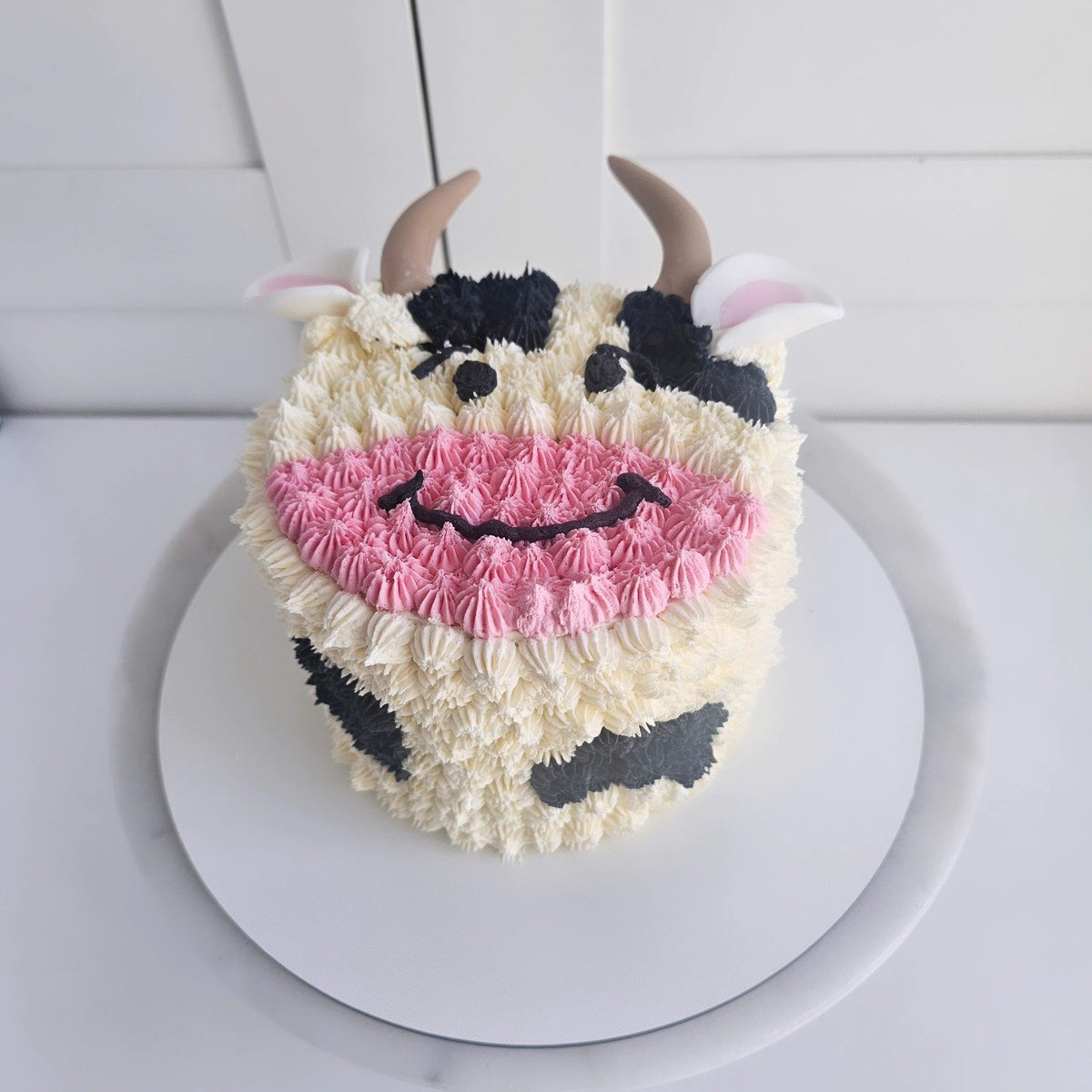 Piped farm cake