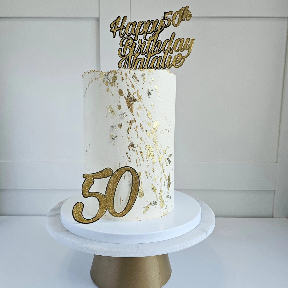 White and gold 50th birthday cake