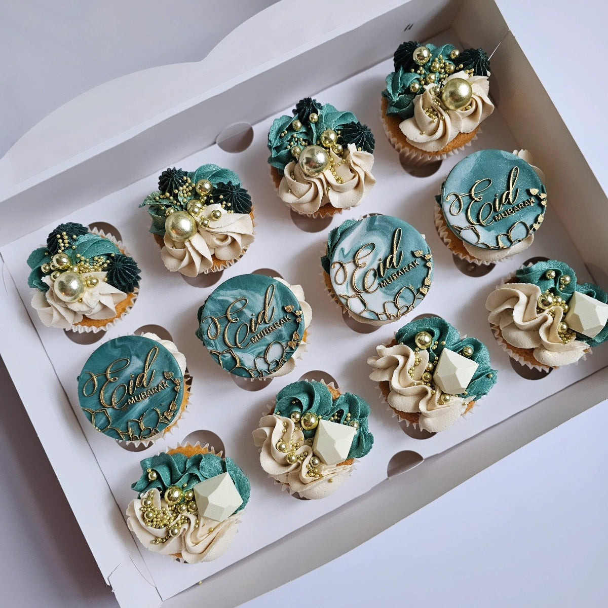 Forest green and gold luxury cupcakes