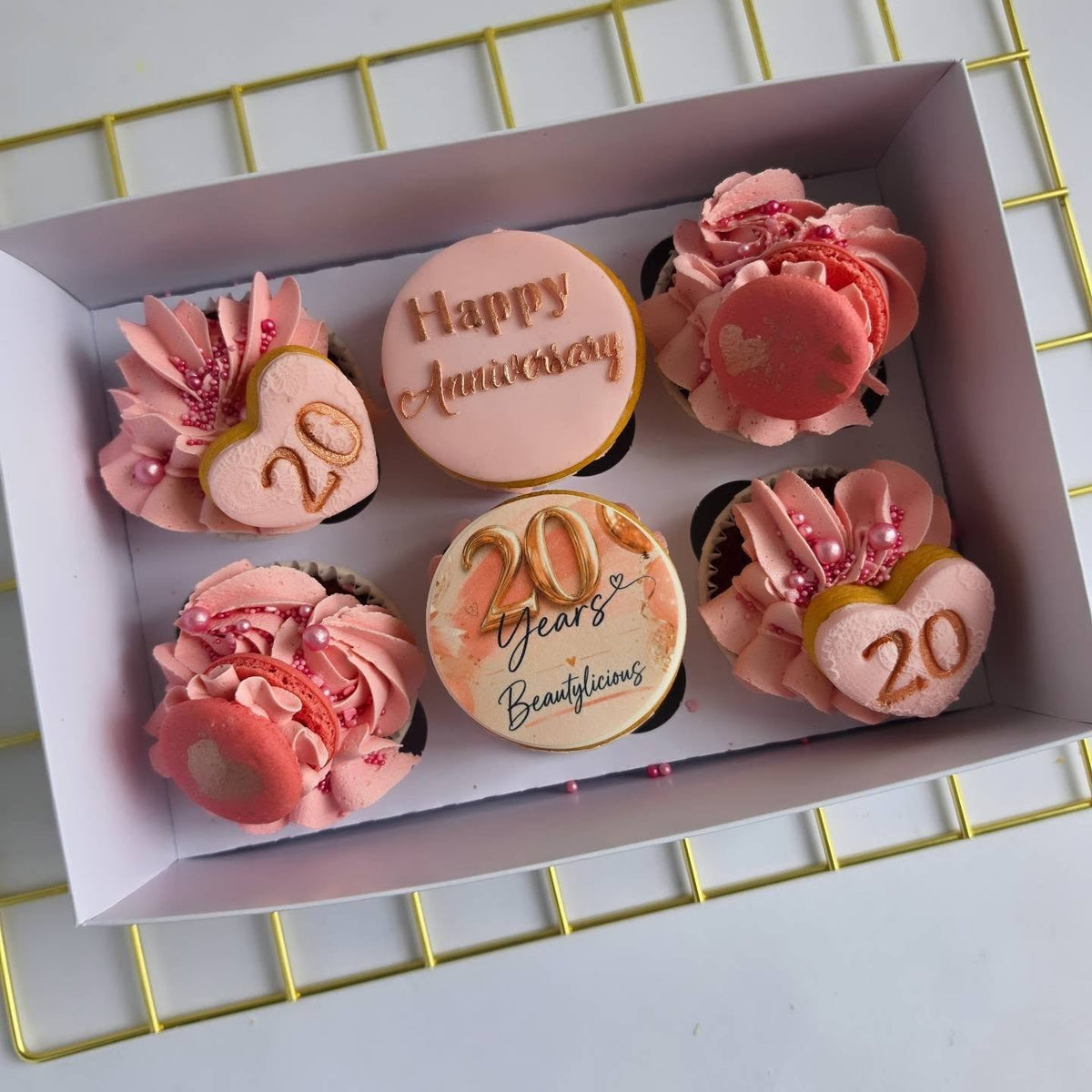 Pink 20th anniversary cupcakes
