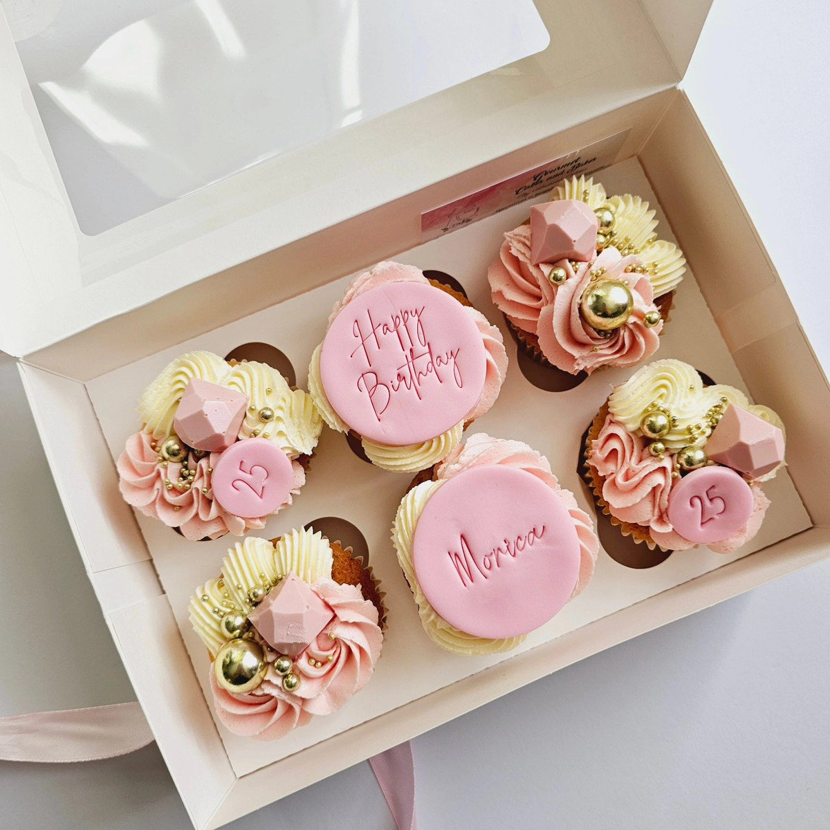 Pink, white and gold birthday cupcakes