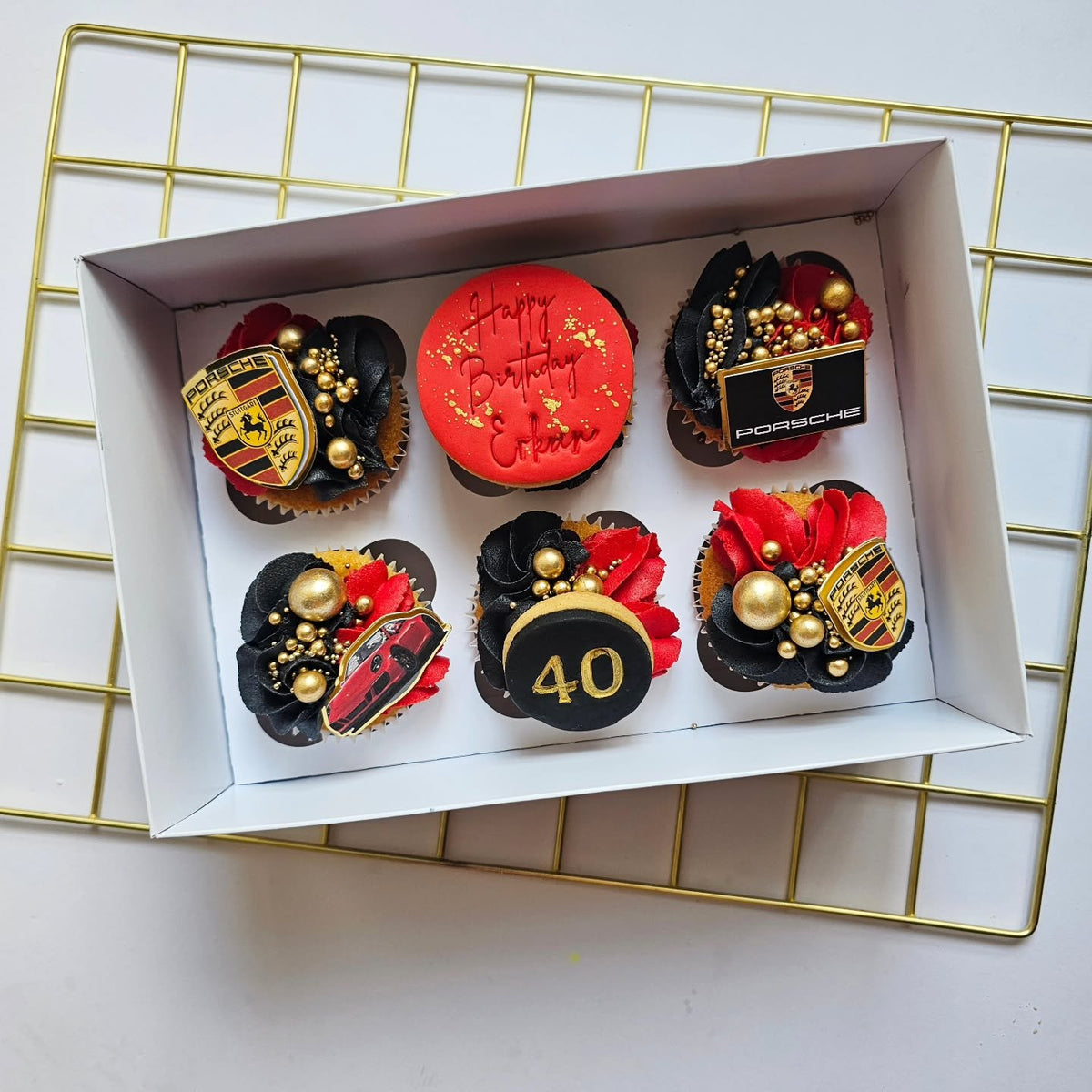 Red and black birthday cupcakes