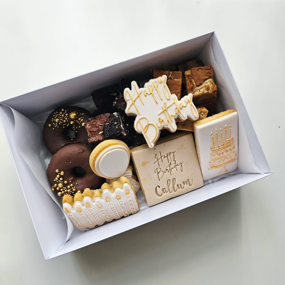 Birthday treat box with bronuts and brownie bites