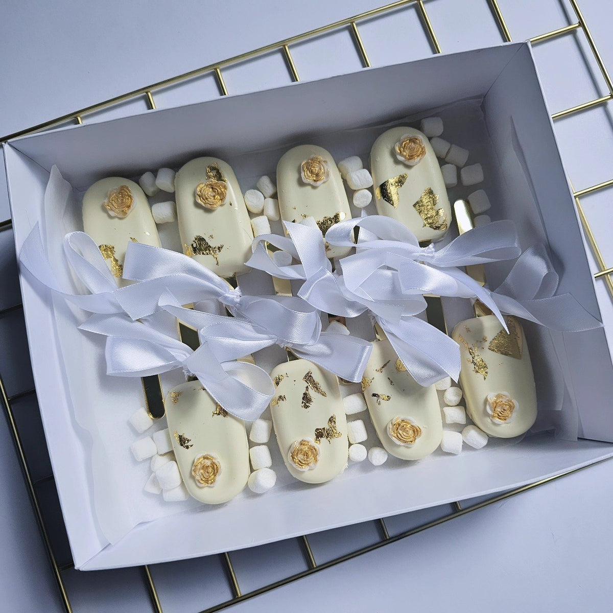 White and gold 21st birthday cakesicles